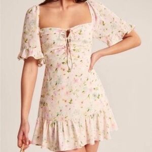 Beautiful floral keyhole dress with flutter sleeves